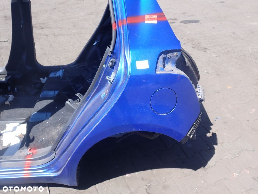 SUZUKI SWIFT MK6 III BŁOTNIK TYŁ LEWY  ZCG - 1