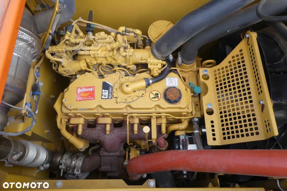 Caterpillar M 318F Z NIEMIEC TRZY ŁYŻKI - 24