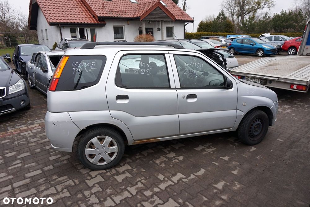 SUZUKI IGNIS II 2003 Z2S 1.3 16V M13A 94KM 2WD SREBRNY na części - 6