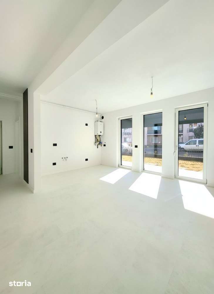 OCAZIE: Apartament nou, la parter, curte privată, finisaje premium — fotografia 1