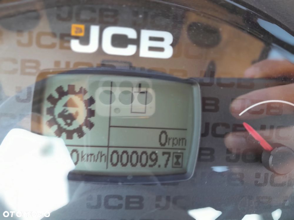 JCB 409 - 23