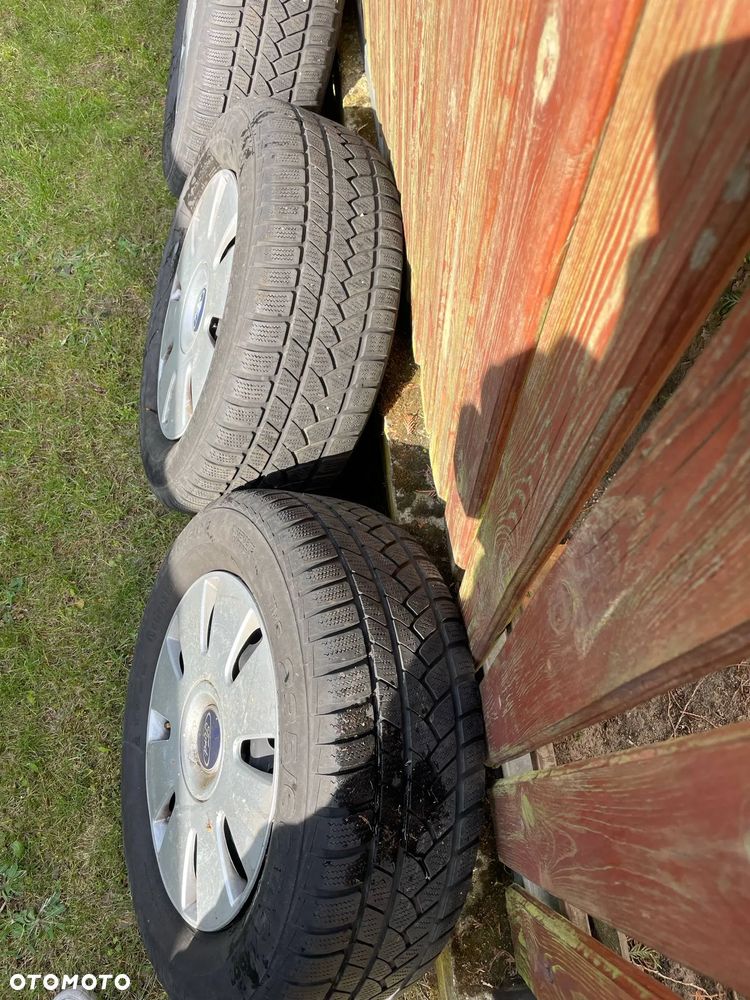 Koła zimowe z kołpakami FORD KUGA 235/60 R16 5x108 - 5