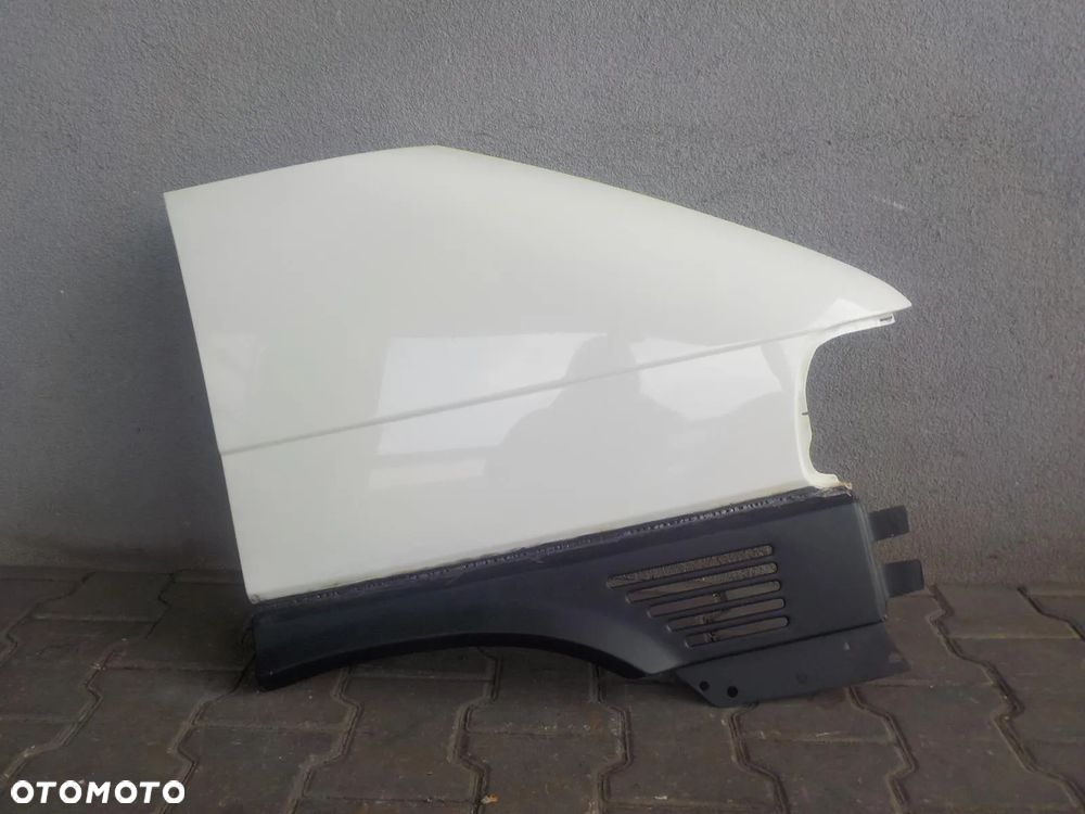 VW T4 CARAVELLE LIFT BŁOTNIK PRAWY PRZÓD - 1
