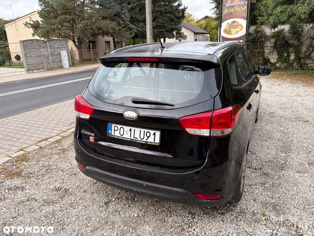 Kia Carens - 12