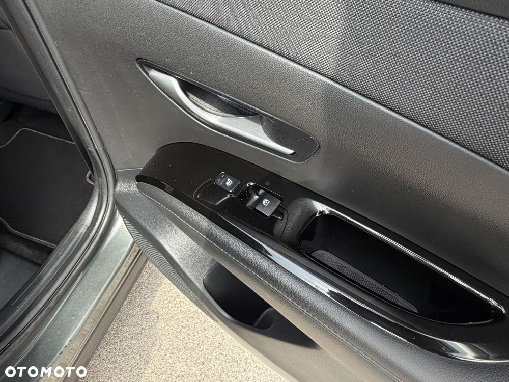 Hyundai Tucson 1.6 T-GDi HEV Executive 4WD - 31