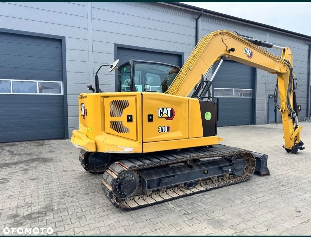 Caterpillar 310 - 3