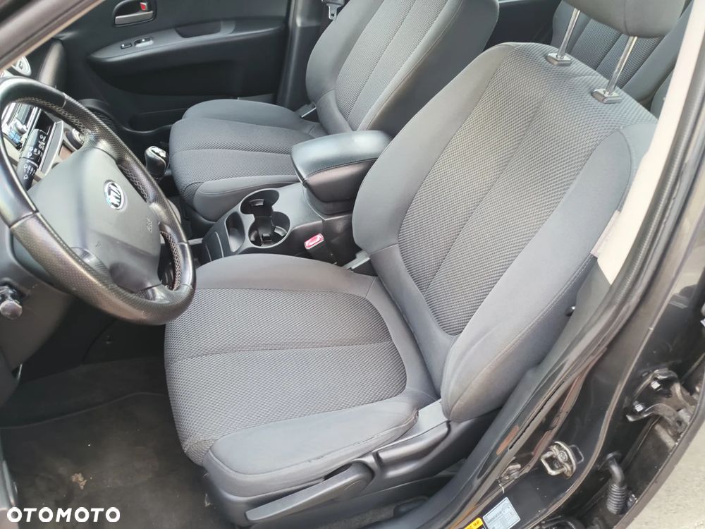 Kia Carens 2.0 CVVT Spirit - 6