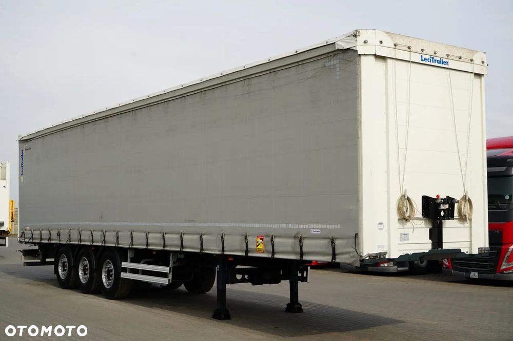 LeciTrailer FIRANKA / STANDARD / MOCNA PODŁOGA SZYNA DESKA / OŚ PODNOSZONA / OPONY 100%  / OSIE SAF - 10
