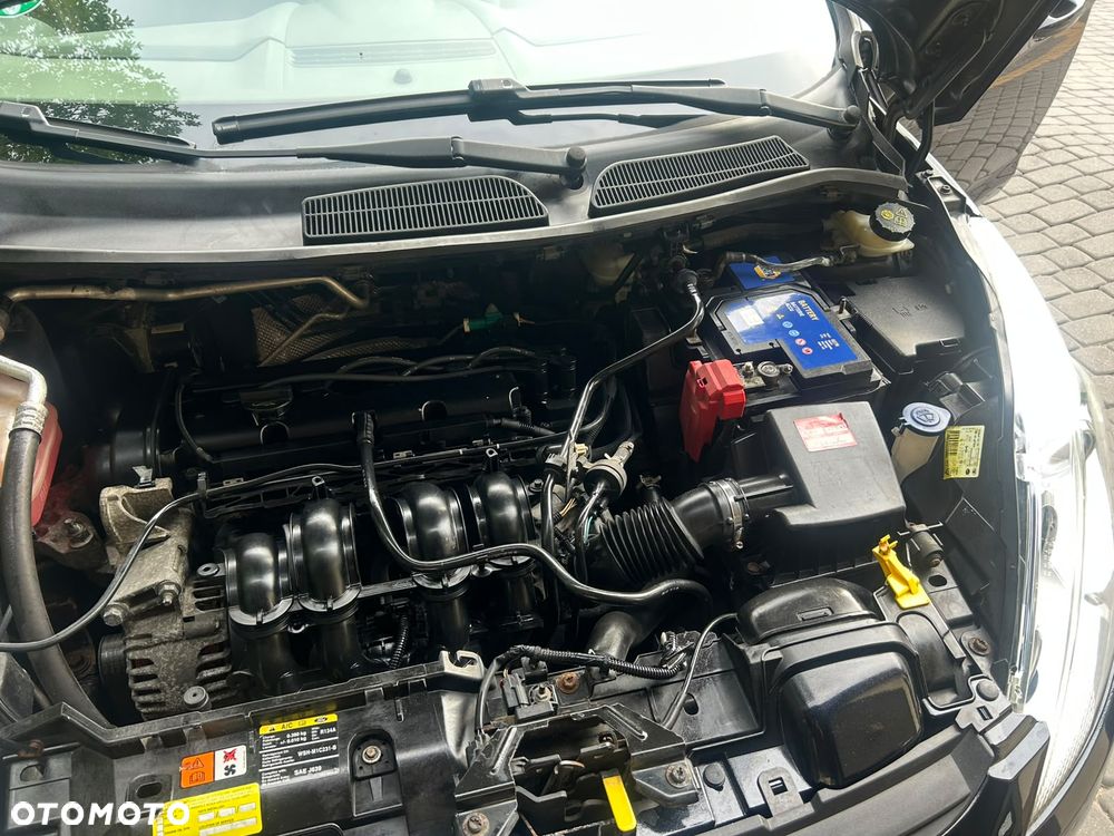 Ford Fiesta 1.4 Ghia - 26
