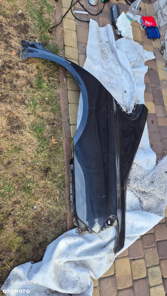 Błotnik lewy tył BMW F01 poszycie - 1
