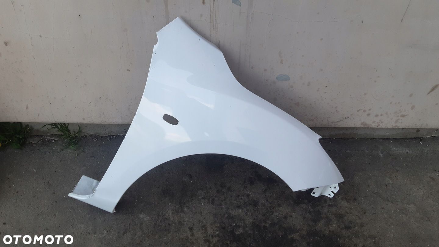 Blotnik prawy przod MAZDA 3 III 08-13r - 1