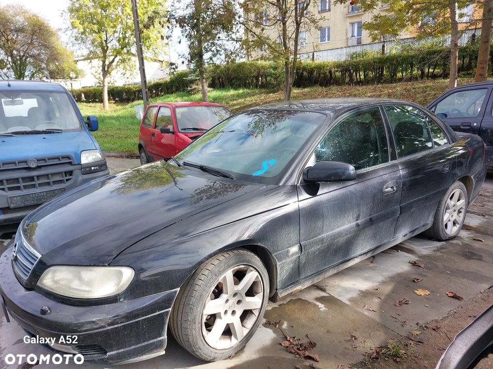 Maska OPEL OMEGA B FL 00R. zderzaki,drzwi,lampy,klapa.... - 2