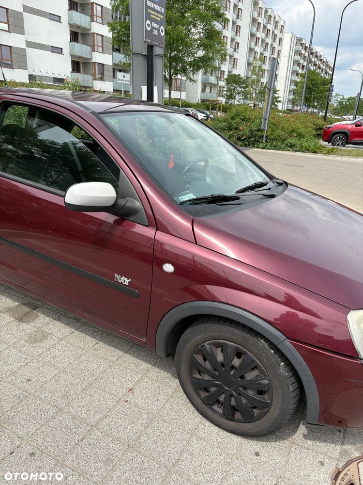 Opel Corsa 1.2 16V NJoy - 4