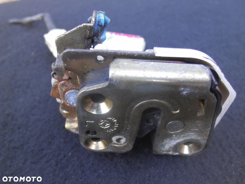 NISSAN X-TRAIL T30 ZAMEK LEWY TYŁ 80553AA300 - 2