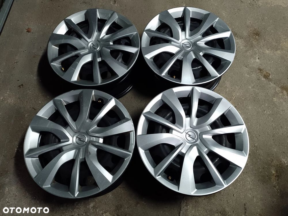 Felgi OPEL 4x108,15- ET20,kołpaki