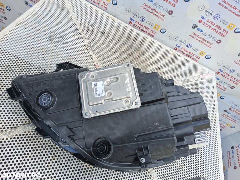 Far Led dreapta Ford Puma  cod l1tb13e014mb far led dreapta cu 1 ureche rupta mic defect - 6