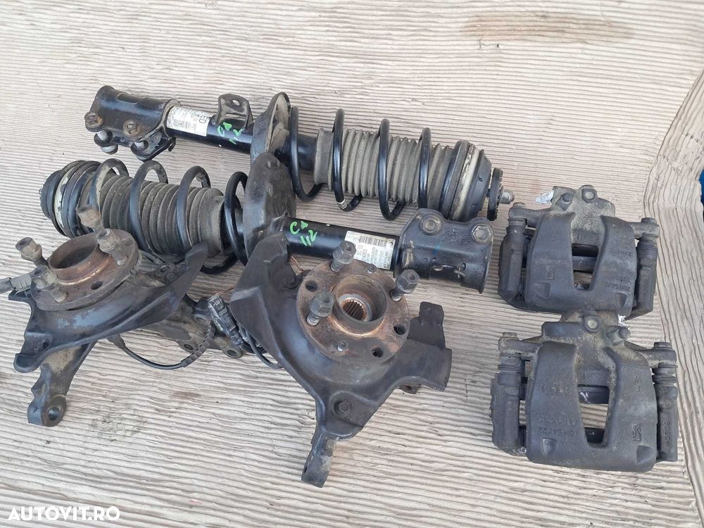Opel Corsa D, fuzete, etrieri, jambe complete ( arc amortizor flansa ) - 1