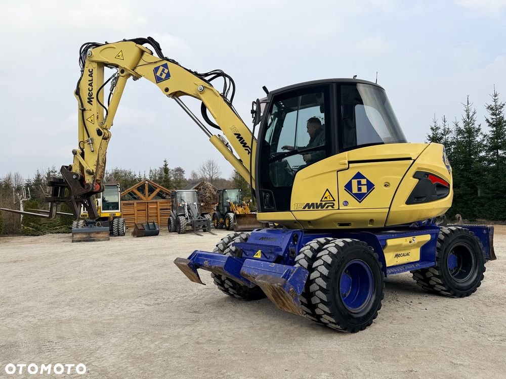Mecalac Koparka 14 ton MECALAC 15 MWR koparko-ładowarka 3 łyżki widły 1 wł Centr.smarowanie Opony na BLIŹNIAKU 80%Camso ładowarka 714 12MTX 4x4 skrętne KLIMA kabina Premium silnik 146KM volvo EW140B DEUTZ szybka 35km/h - 33