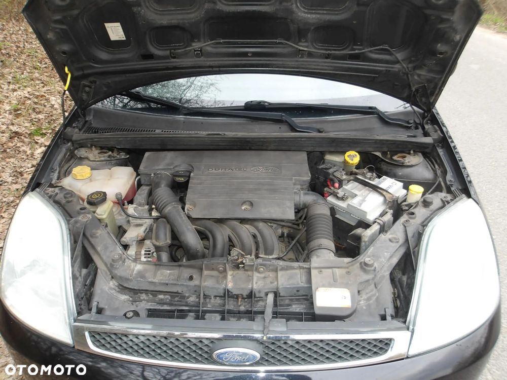 Ford Fiesta 1.4 Ghia - 30