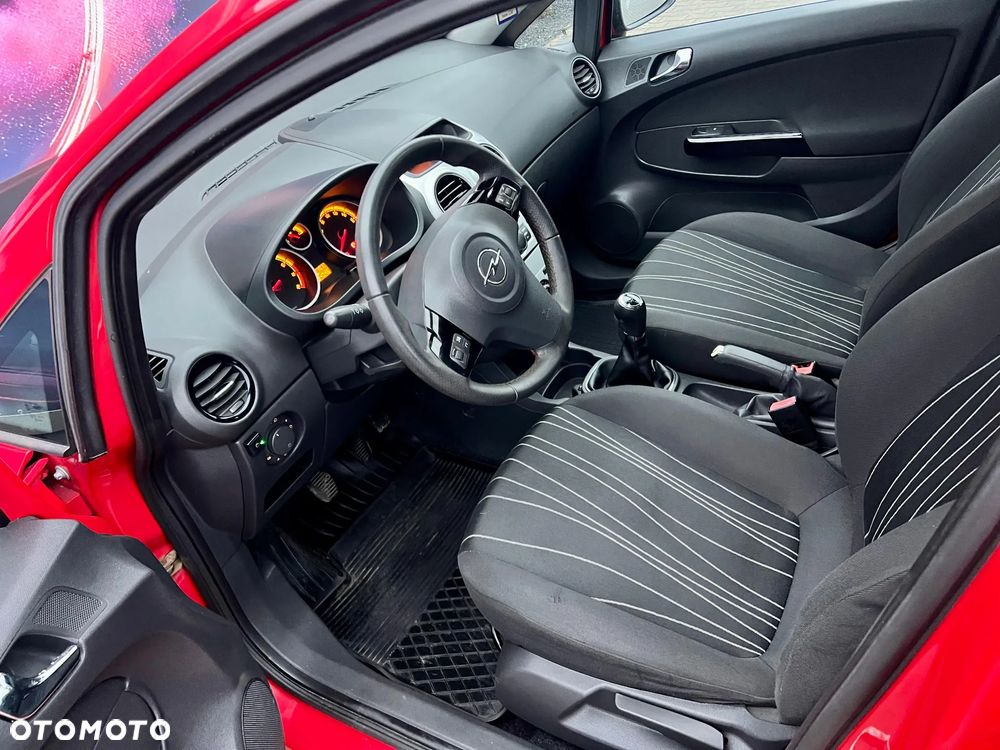 Opel Corsa 1.4 16V Cosmo - 10