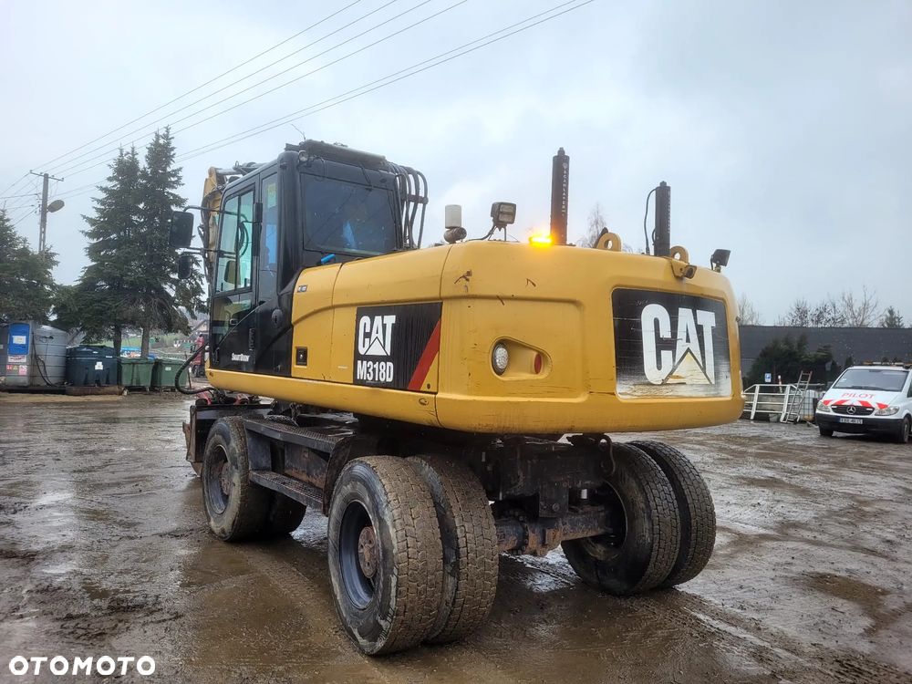 Caterpillar M318D - 2