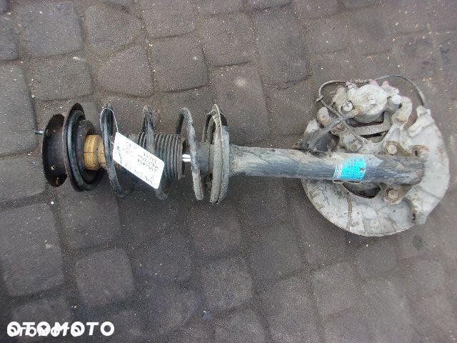 ZACISK HAMULCOWY BMW E36 1.8 PRAWY - 1