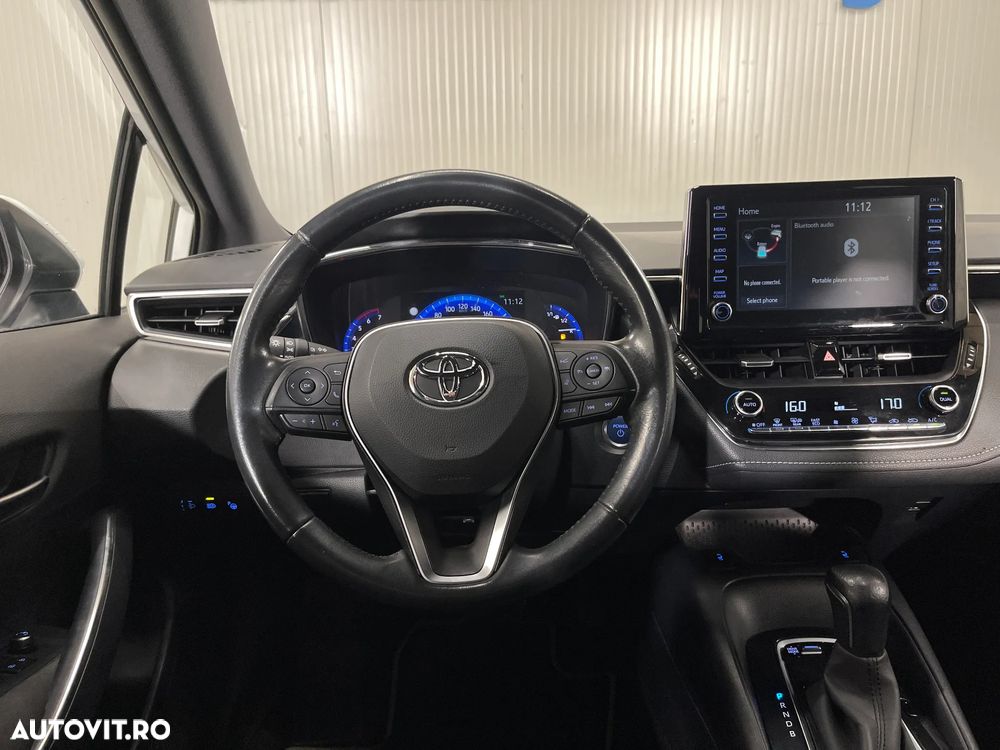 Toyota Corolla 1.8 HSD Business - 7