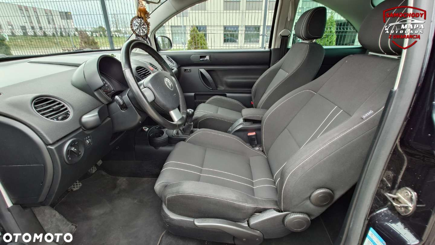 Volkswagen New Beetle - 7