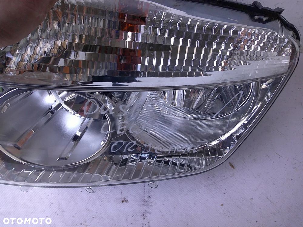 dacia duster i 1 lampa przód lewa nowa oryginał z uszk - 10