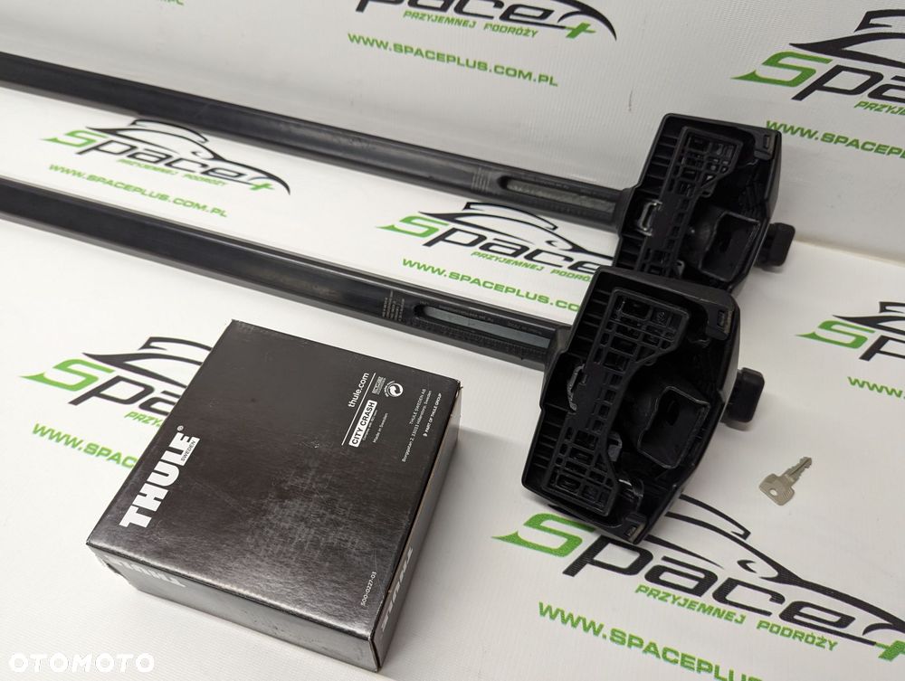 Bagażnik dachowy Thule: belki 7125 + Stopy 7105 + kit - 6
