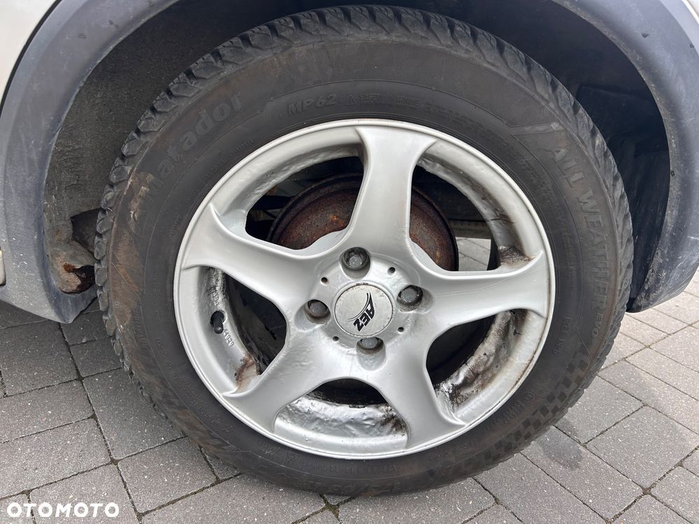 Opel Corsa 1.2 16V Cosmo - 12