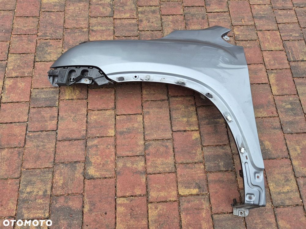 blotnik lewy przod chevrolet trax - 1