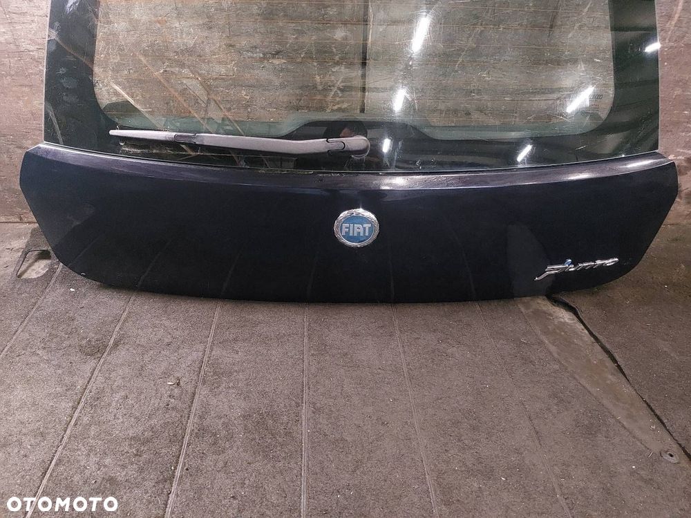 KLAPA BAGAŻNIKA ZDERZAK LAMPY GRANDE PUNTO I 475 - 23