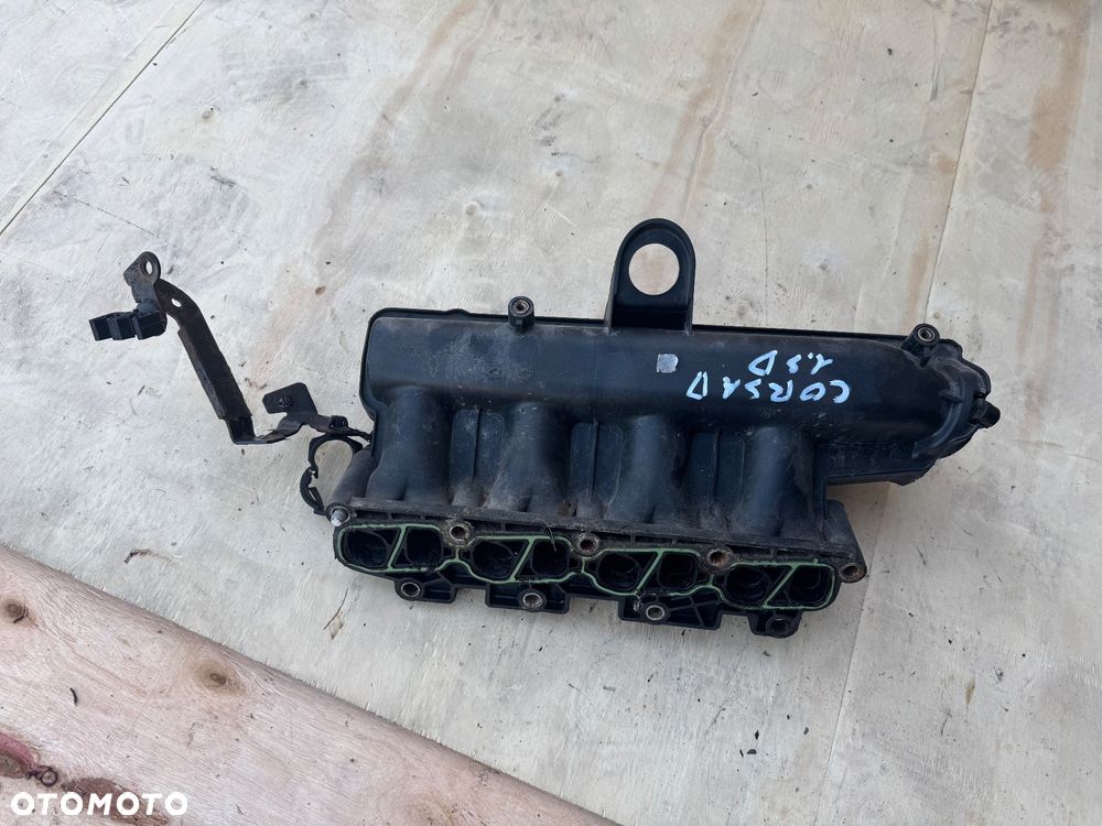 Opel Corsa D 1.3 cdti 75 km kolektor ssący - 1