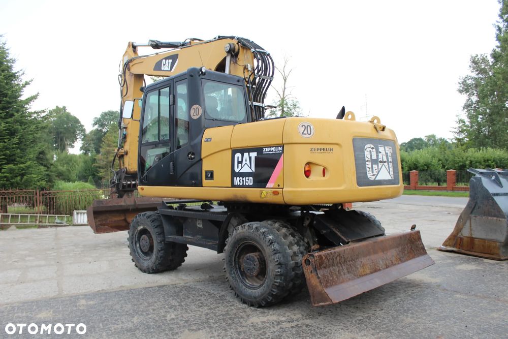 Caterpillar CAT M 315 D z Niemiec - 3