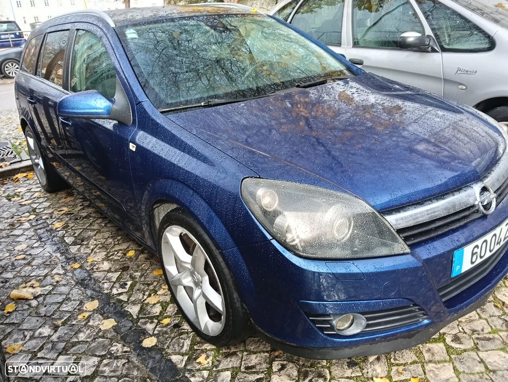 Opel Astra Caravan 1.9 CDTi Cosmo - 1