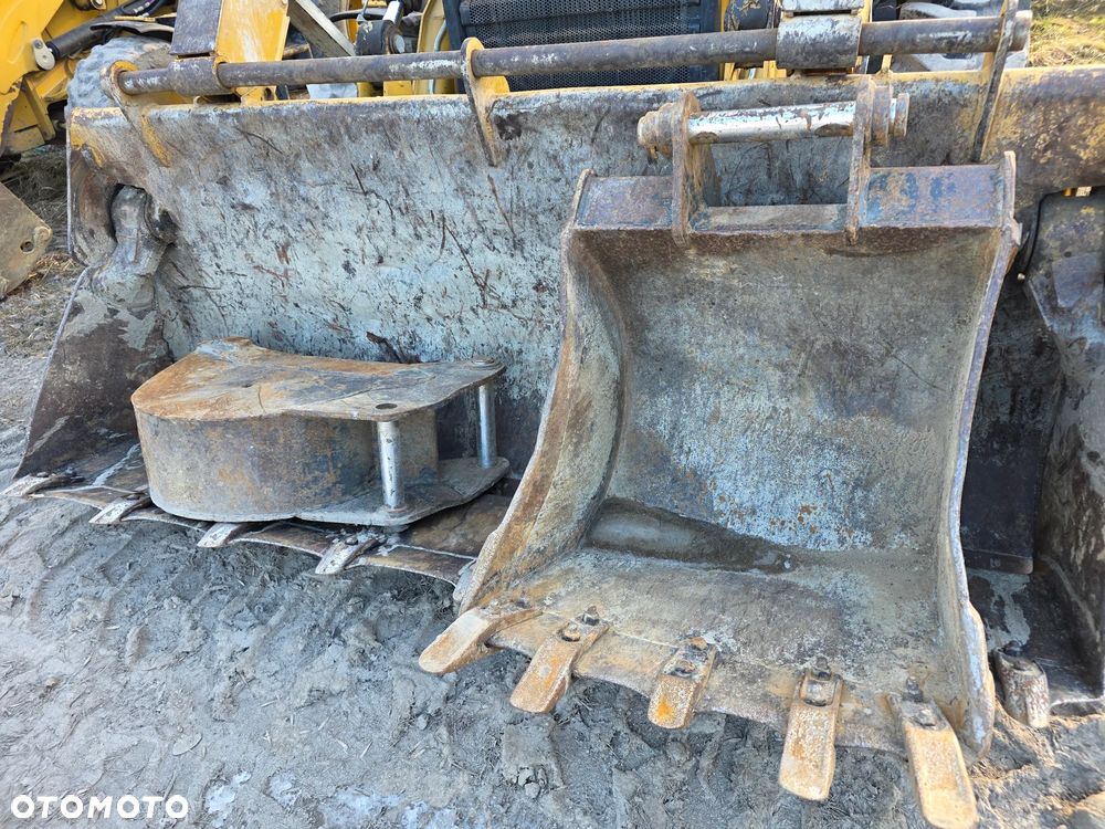 Caterpillar 428 - 11