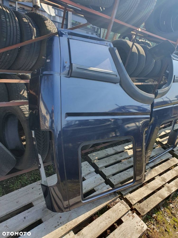 BŁOTNIK L/P TYŁ LAND ROVER DISCOVERY II 2 - 3