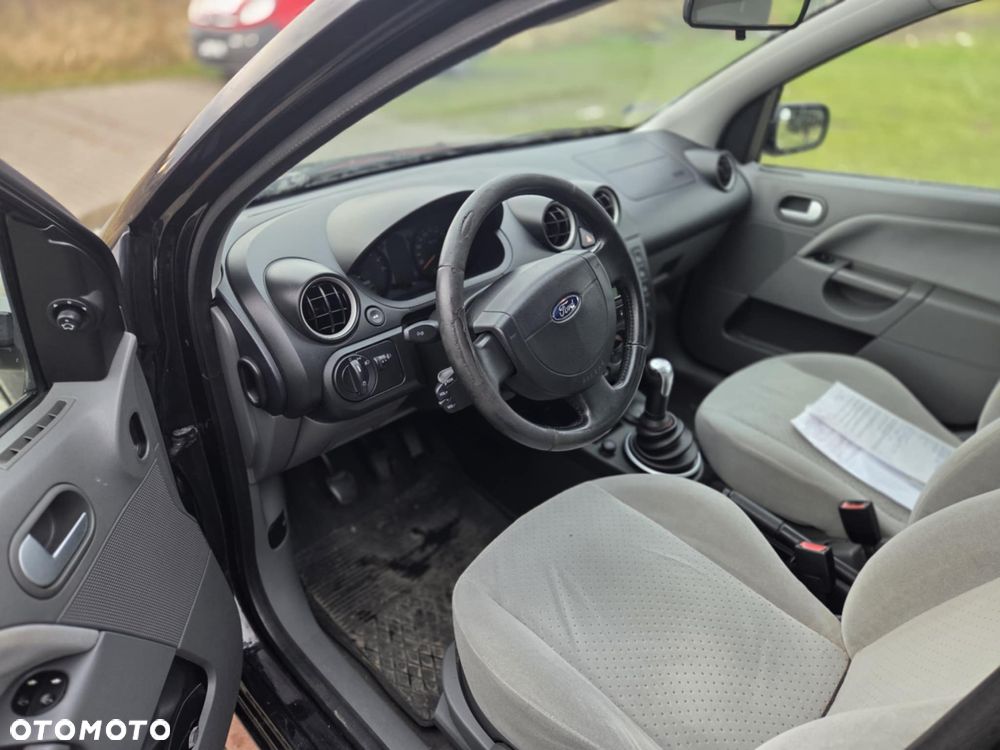 Ford Fiesta 1.4 Ghia - 13