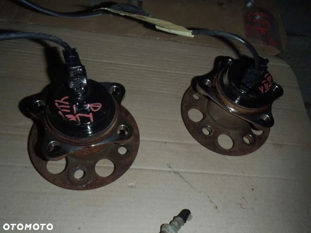piasta łożysko abs tył toyota yaris I 1 II III wersja pod tarcze jak nowe - 6