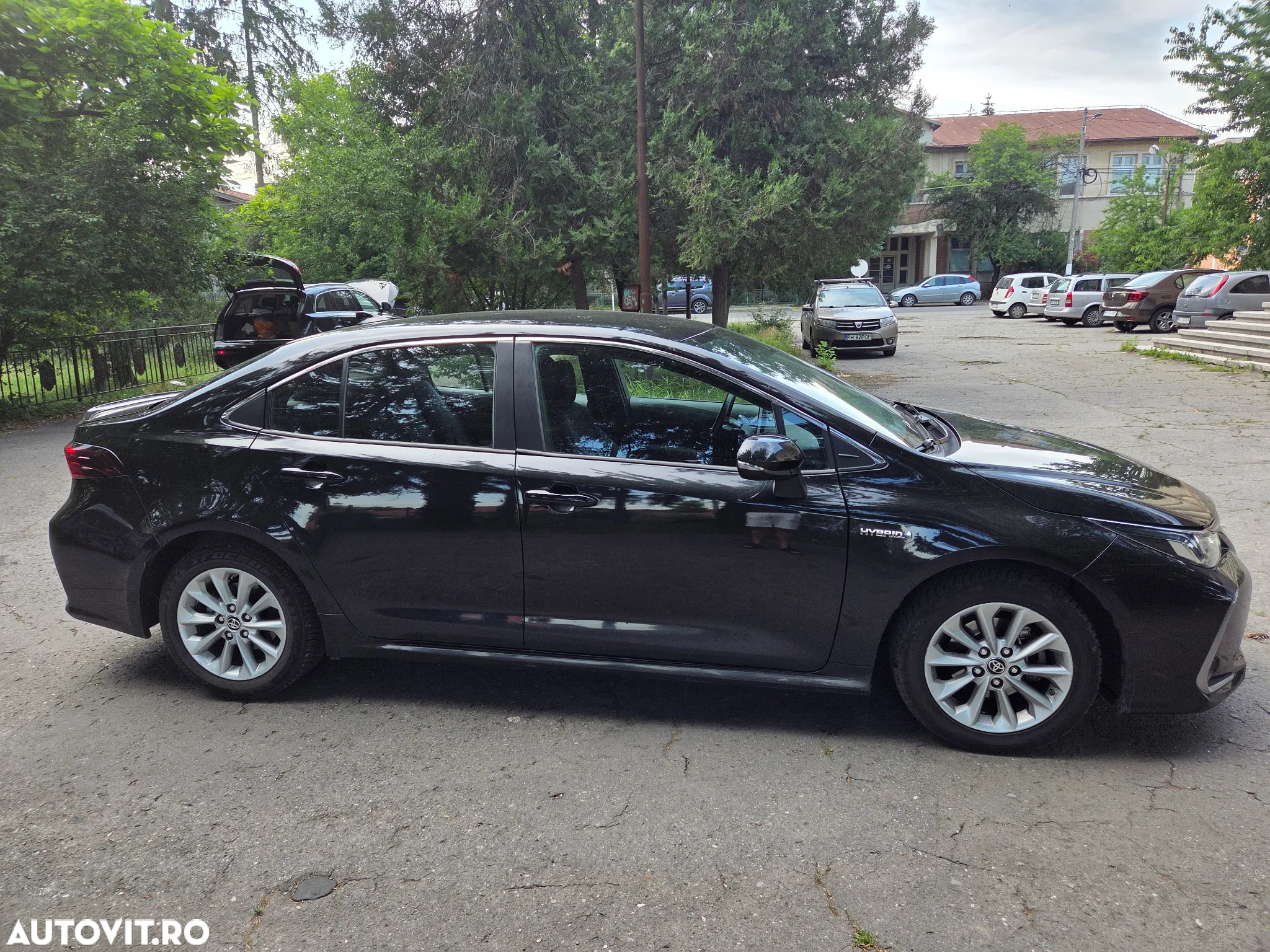 Toyota Corolla Sedan 1.8 HSD Business - 14