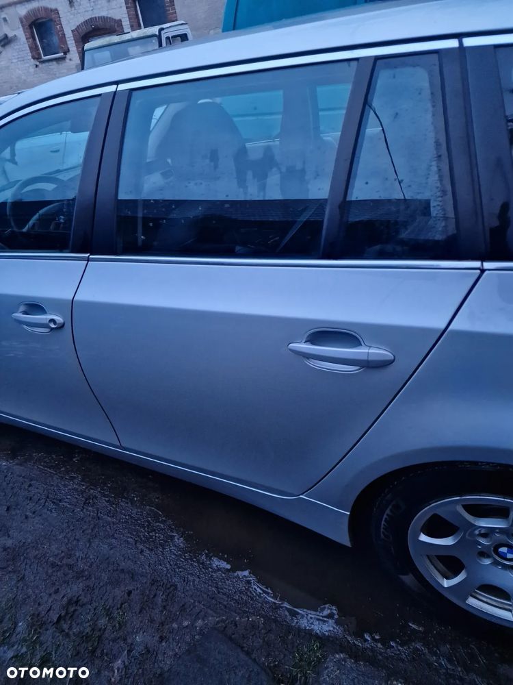 Drzwi  lewy  tył  BMW  E61 w kolorze  354 - 2