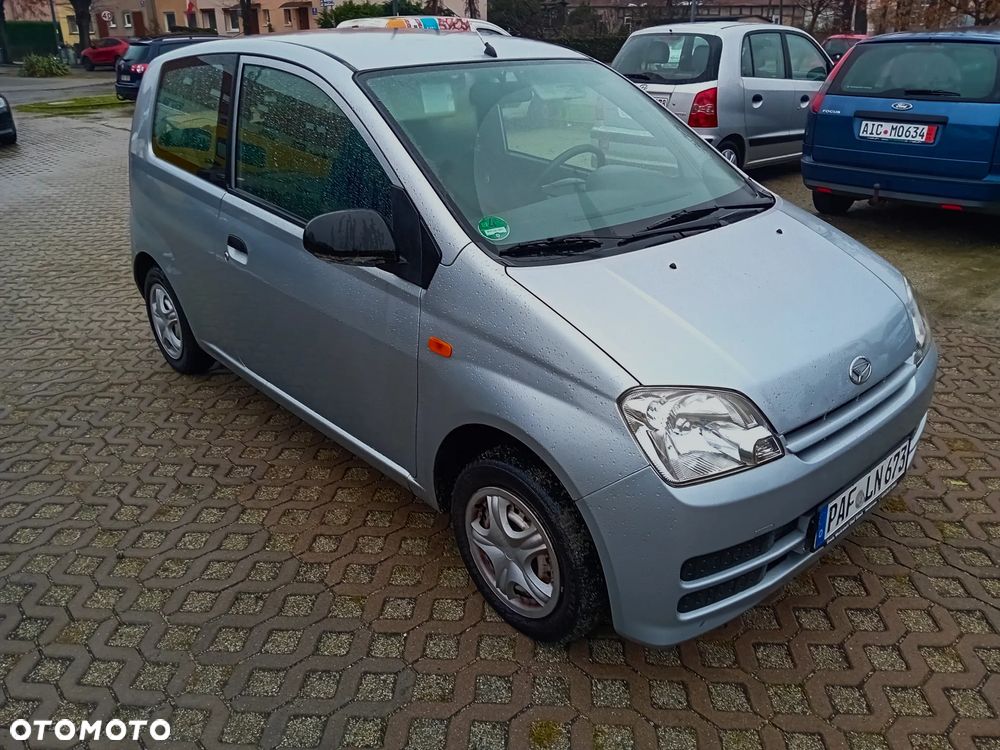 Daihatsu Cuore 1.0 Top Sunshine - 1