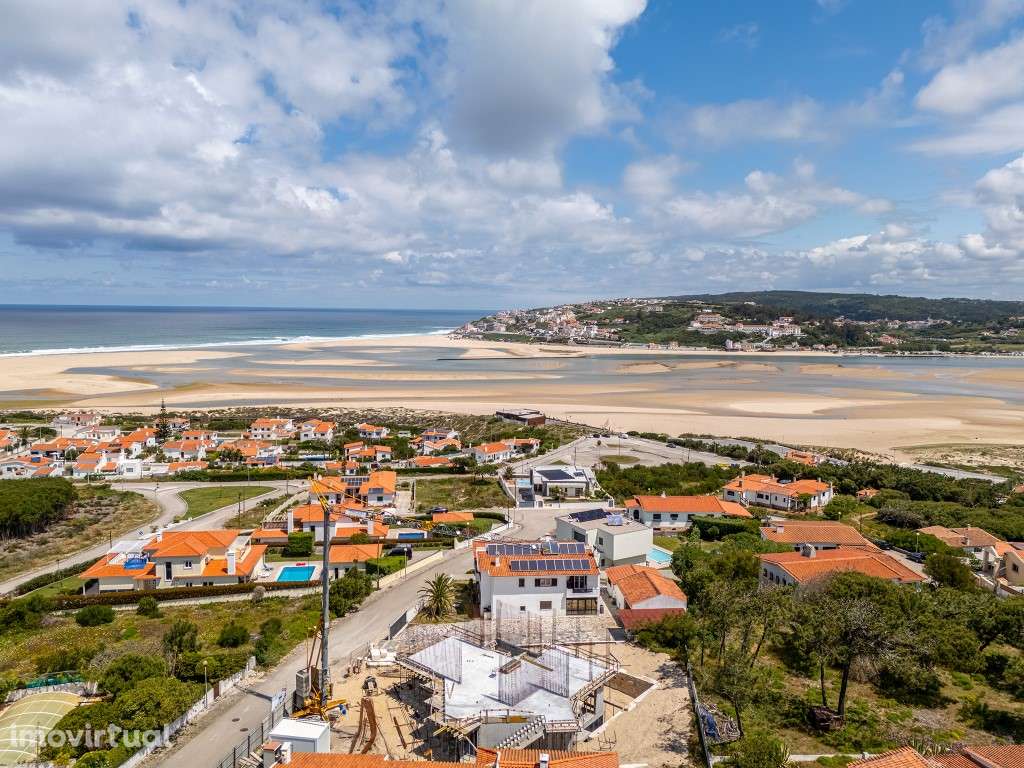 Moradia vista lagoa, praia e mar perto de vários campos de golfe - Grande imagem: 4/19