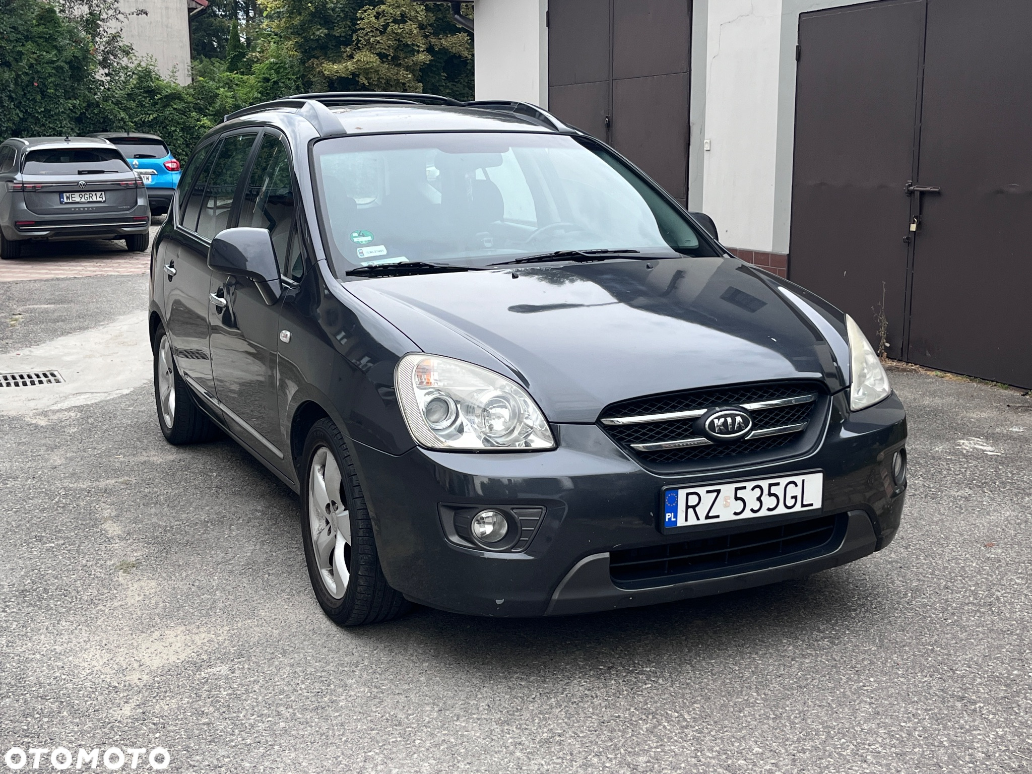 Kia Carens - 4
