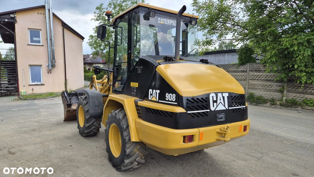 Caterpillar 908 - 6