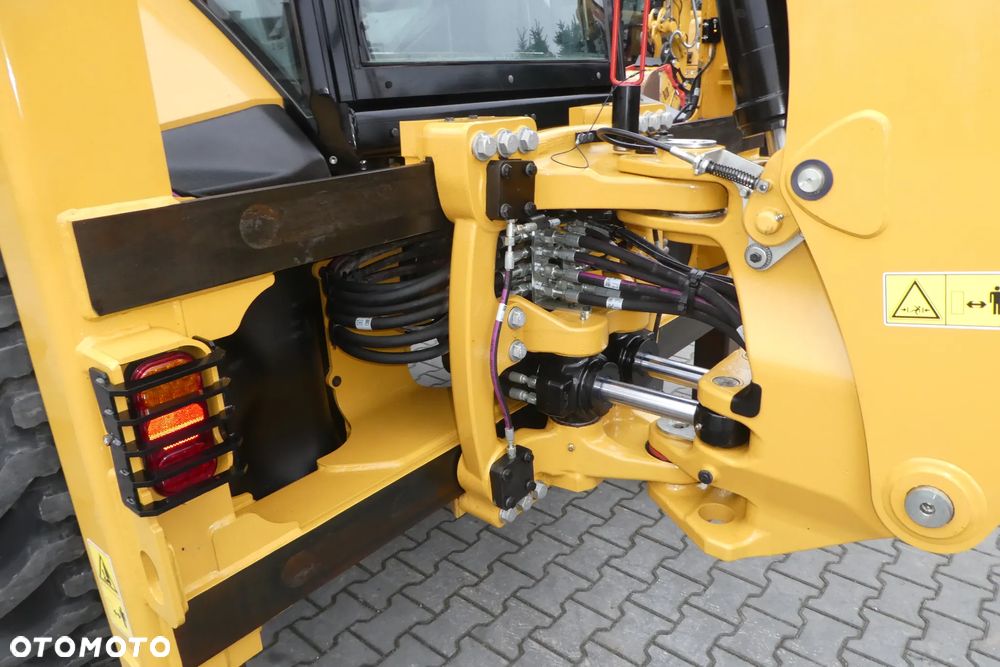 Caterpillar 444 -O7A Z NIEMIEC - 21