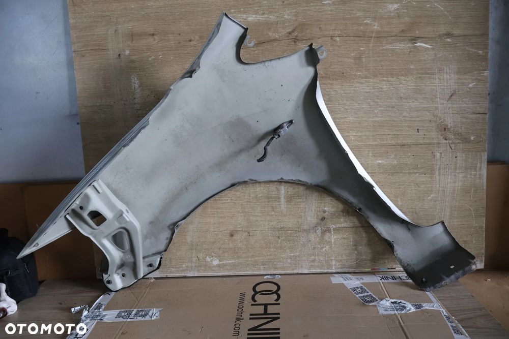 TOYOTA AURIS I 07-09R BŁOTNIK PRZÓD PRZEDNI PRAWY 1C0 - 12