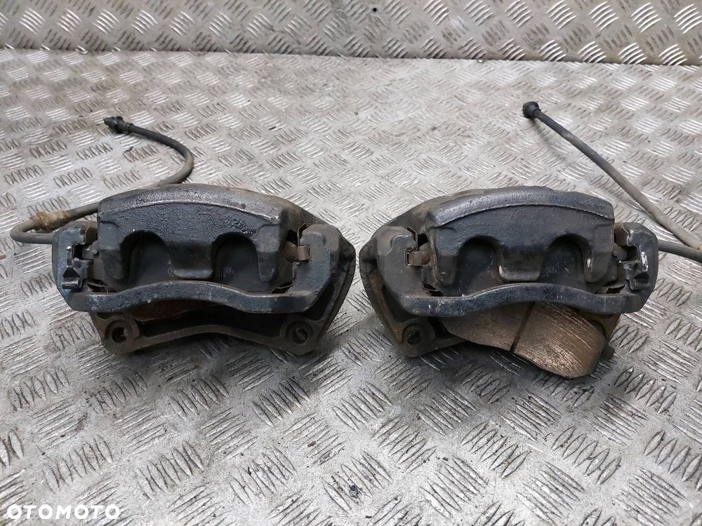 TARCZE HAMULCOWE PRZÓD + ZACISKI RENAULT KOLEOS I 2.0 DCI - 8