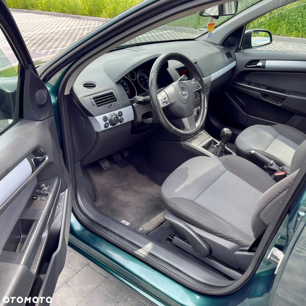 Opel Astra 1.8 Edition Plus - 12